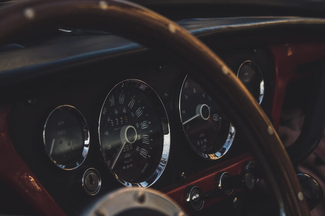The dashboard of a vintage car
