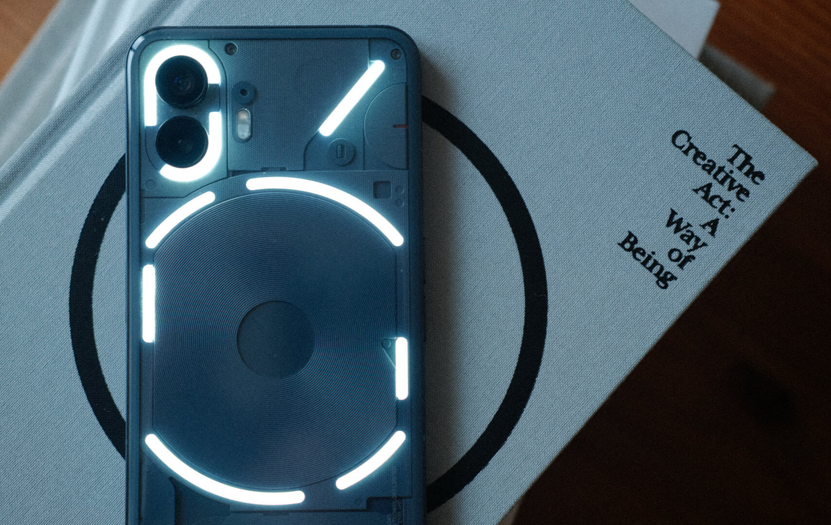 The Nothing Phone 2, with the glyph illuminated